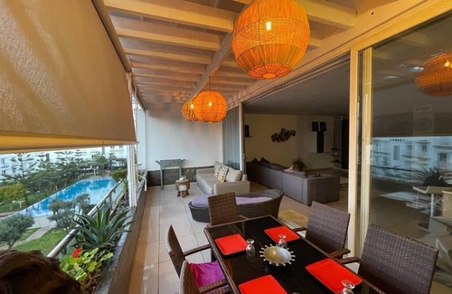 Tamariss Apartment | Lovely apartment with sea view, pool and garden