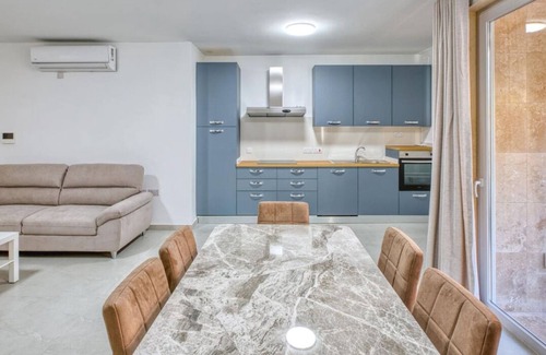 Mellieha Apartment | Lovely Apartment with 2 free Pool Access,WIFI & AC