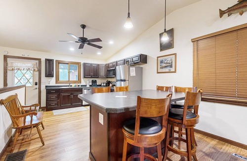 Nekoosa House | Lovely lakefront home with a game room, firepit, dock & W/D - private beach area