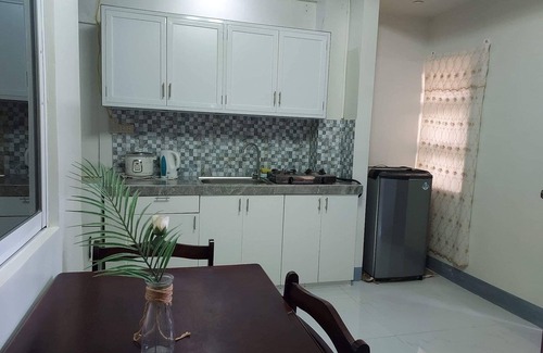Daet Apartment | LoveNest- cozy place with swimming pool,12 min to the beach close to everything.