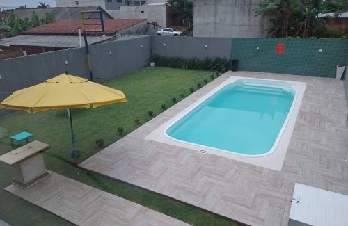 Guaratuba House | Lower part of the house with swimming pool and air conditioning Guaratuba PR