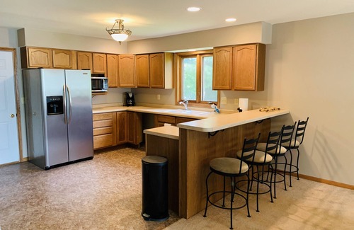 Tomahawk House | Lower unit with 400 ft of frontage and close to town