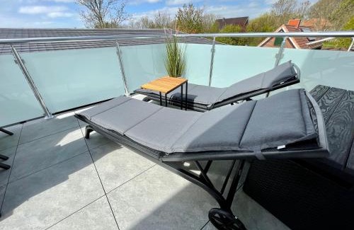 Wremen Apartment | Luv-Moderne Neubauwohnung in Strandnähe-Wallbox