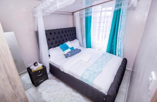 Mbotela Apartment | Lux Suites Oak South Gardens Apartments