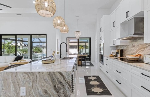 Pelican House | Luxe Cape Coral Escape with Heated Pool & Game Room