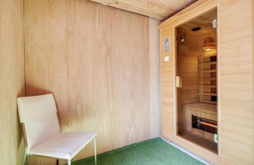 Bosgebied Hoenderloo Ski Chalet | Luxe Chalet Veluwe Sauna en Hottub