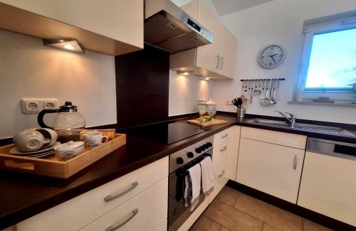 Ferienhausgebiet Hillenseifen House | Luxuriöses, familienfreundliches Ferienhaus ,Amy, mit Whirlpoolwanne, Kamin und Garten