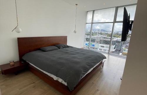 La Carolina Apartment | Luxurious 1-bedroom Condo in Iconic City Building