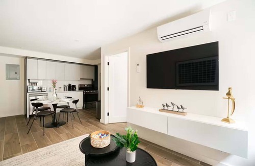 Central Park South Apartment | Luxurious 1BR w/Private Patio near Central Park