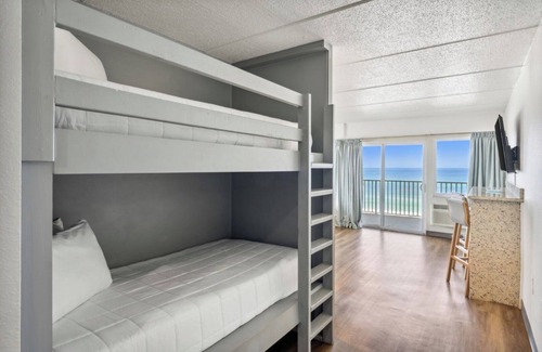 Fort Bay Hotel | Luxurious Beachfront Suite with Queen Beds, Kitchen, and Split Accommodations