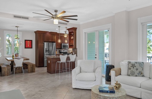 Stillwright Point House | Luxurious tropical water-front Heated pool home with Boat Dock and two master .