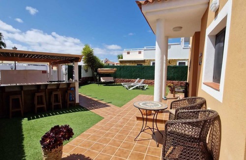 Caleta de Fuste Villa | Luxury 3 bedroom villa overlooking golf course with private pool and Wi-fi