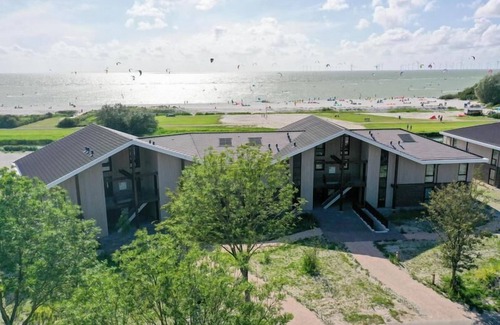 Workum Apartment | Luxury 4-person apartment with sauna, bathtub, and balcony overlooking the IJsselmeer. Ideal for a relaxing stay by the water.