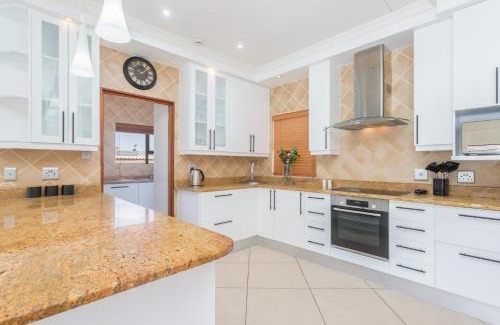 West Beach House | Luxury 5 Bedroom Villa with Heated Pool and Inverter in Blouberg