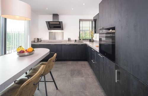 Zeewolde House | Luxury 6-person villa on the water. Including sun shower, canoe, sup board, beautiful garden and private jetty. Enjoy peace and comfort!