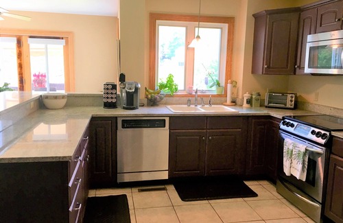 Treasure Lake House | Luxury Lakefront Home: Private dock & outside entertainment areas in resort.