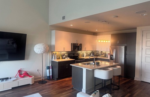 Market District Apartment | Luxury Loft Penthouse in the Heart of the City with Skyline Views – 1BR, 1.5BA