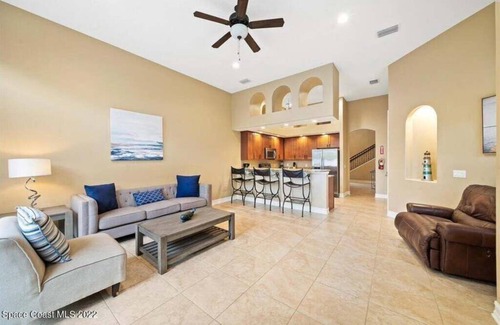 Indian Harbour Beach House | Luxury Mediterranean villa with courtyard by the beach where you eat, play love.