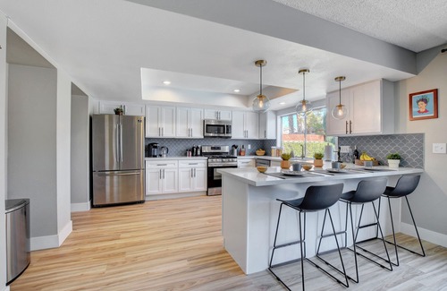 Paradise House | Luxury Modern Two Story Mini Mansion w/Heated Pool + Putting Green