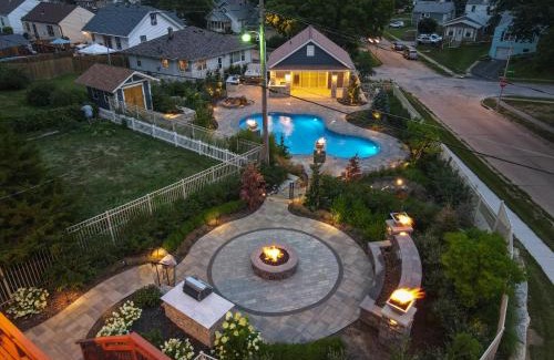 Southeast Omaha House | Luxury Oasis Heated Pool, Hot Tub, BBQ