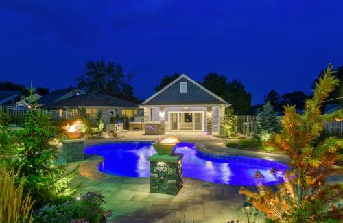 Southeast Omaha House | Luxury Oasis Heated Pool, Hot Tub, BBQ