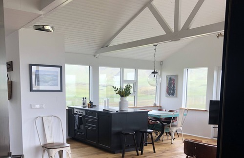 Kjosarhreppur House | Luxury Oceanfront Lodge with mountain view and natural Geothermal hot spring