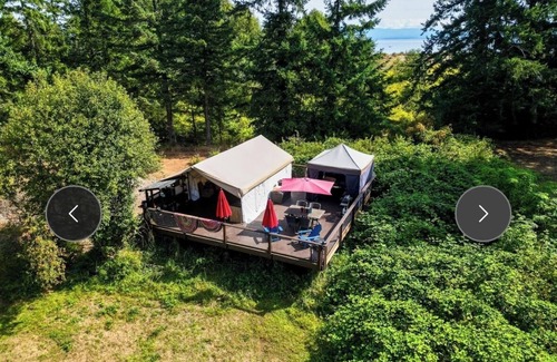 Campbell River RV Rental | Luxury Safari tent adjacent to the beach, following a nature trail to the river