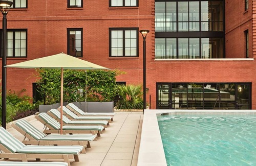 Yamacraw Village Apartment | Luxury Savannah Loft + Pool, Bikes & Dining