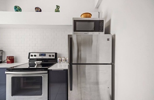 Santurce Apartment | Luxury windows over Condado Beach, San Juan