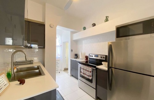 Santurce Apartment | Luxury windows over Condado Beach, San Juan