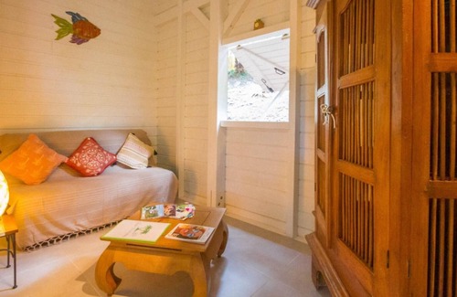 Pointe-Noire RV Rental | MABOUYA Creole bungalow sleeps 2 (a clic clac sleeps an additional 2)