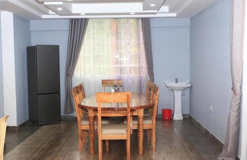 Arusha Apartment | Malala River House Deluxe Double Room unit 7