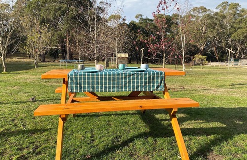 Mount Doran House | Man Cave with a touch of Lux. and an open fire.