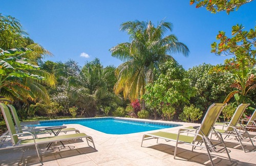 Palmetto Bay House | Manicured Garden Setting | Private Pool | Private Beach & Dive Resort