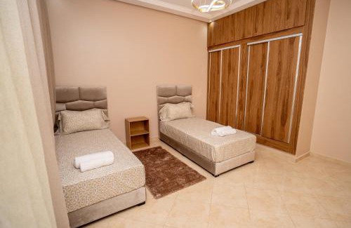 Tangier Apartment | Marina Bliss - Appartement Spacieux & Charmant - 5' à pied de la Marina, de la plage et de la Corniche - WIFI, AC, IPTV