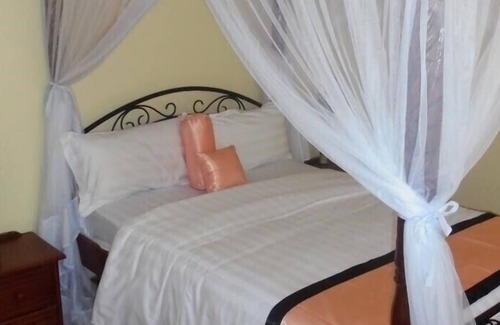 Ruaka Hotel | Mayweather Suites