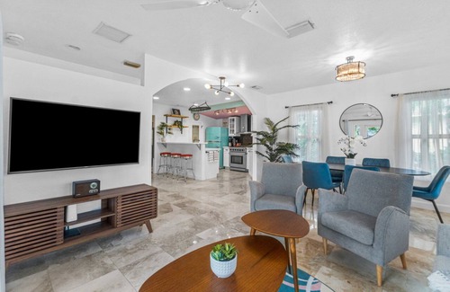 West Palm Beach House | Mid-Century Gem: Pool, Privacy, and Palm Trees