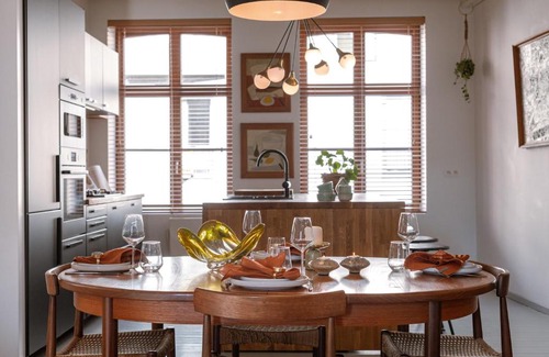 Historical Center Bruges Apartment | Midcentury design apartment with outdoor patio