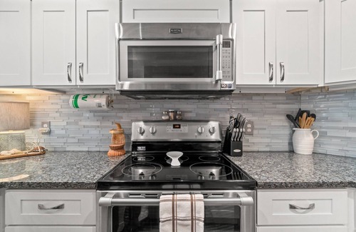 Biltmore Beach Condo | Million Dollar View On Family Friendly Beach - Includes Beach Chairs