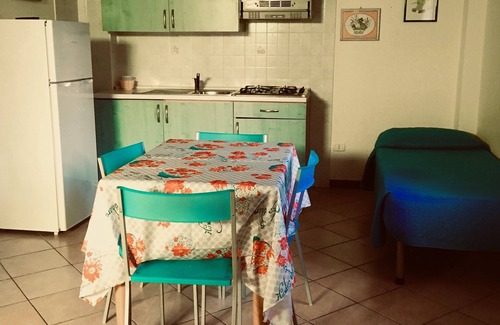Defensola Apartment | MIMOSA B TRILOCALEin Residence Villa Carla 2 bedrooms, living room kitchenette