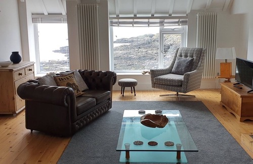 Holyhead House | Min y don is a detached house with spectacular sea views, near treaddurbay beach