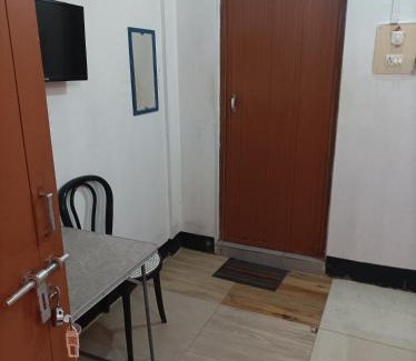Sualkuchi House | Mini Home AC Family room