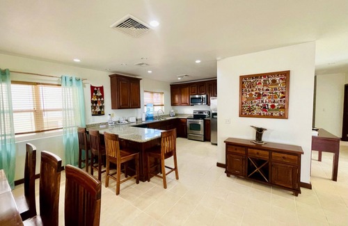 San Pedro Condo | Miramar 8 Gorgeous views with kayaks, pool, pier, palapa, & more!