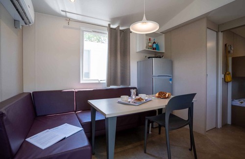 Mandrione House | Mobilehome with half-imagined wooden terrace