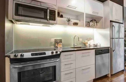 West Don Lands Condo | Modern 1-Bed Condo Downtown. Steps from Distillery District, Remote Work Ready