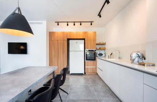 Ramat Hasharon Apartment | Modern 2BR Apt w Private Parking in City Center by Sea N' Rent