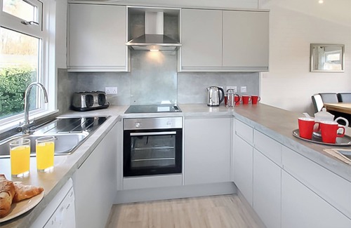 Swanage Ski Chalet | Modern and contemporary two bedroomed lodge with one double and one twin.