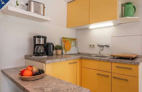 Luetow Apartment | Modern bungalow in Lütow on the Achterwasser with terrace and jetty access -