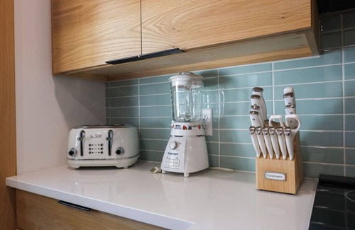 Elkhorn House | Modern bungalow in Old Towne Elkhorn,walk to dining & entertainment or enjoy private fenced yard