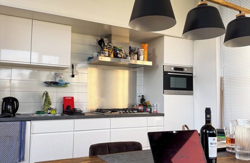 Olburgen House | Modern Chalet with Fenced Garden, Boat Mooring, Sauna and Pool in Olburgen